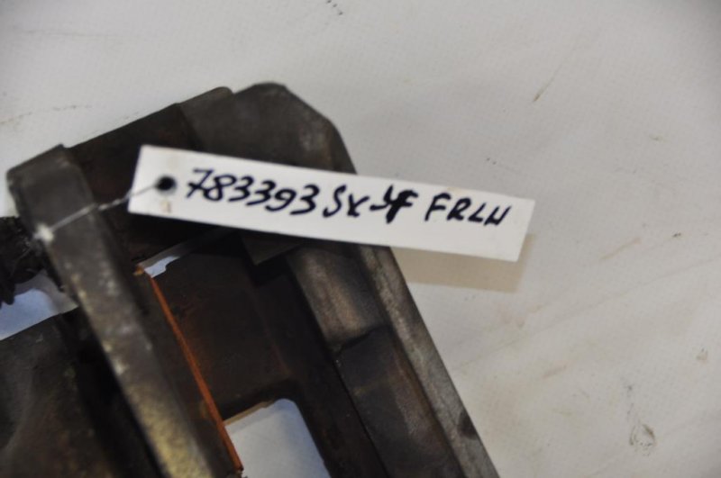 Суппорт тормозной передний левый SX4 06-13