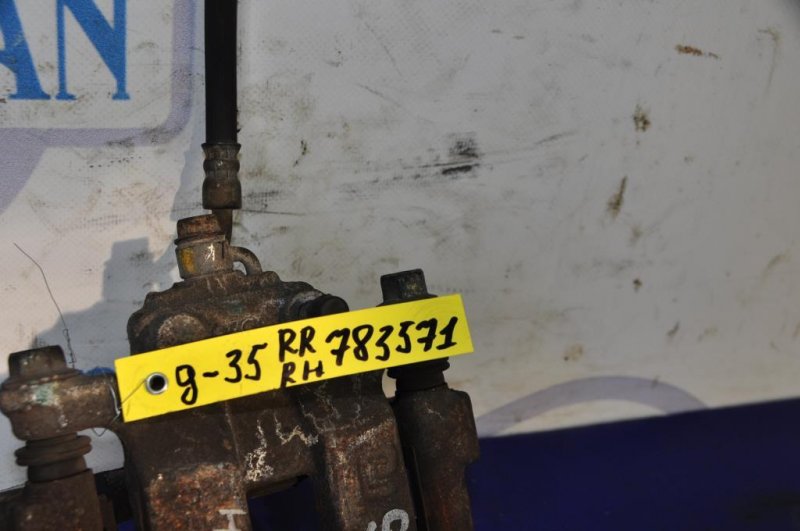 Суппорт тормозной задний правый INFINITI G35 03-07