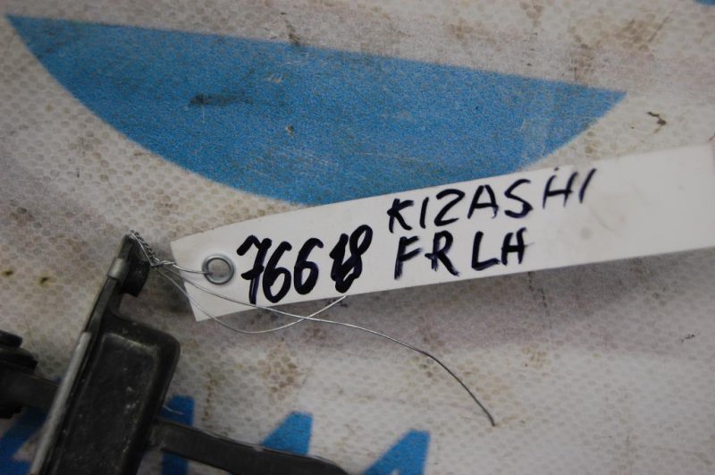 Ограничитель двери передний левый KIZASHI 09-14