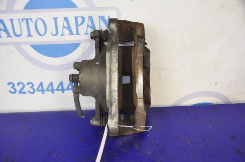 Суппорт тормозной передний левый TOYOTA RAV4 05-12