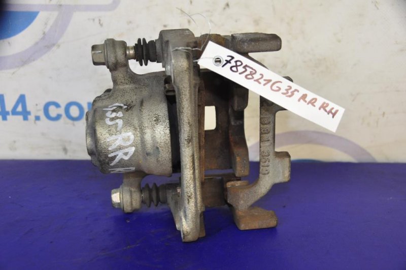 Суппорт тормозной задний правый Q50 15-20