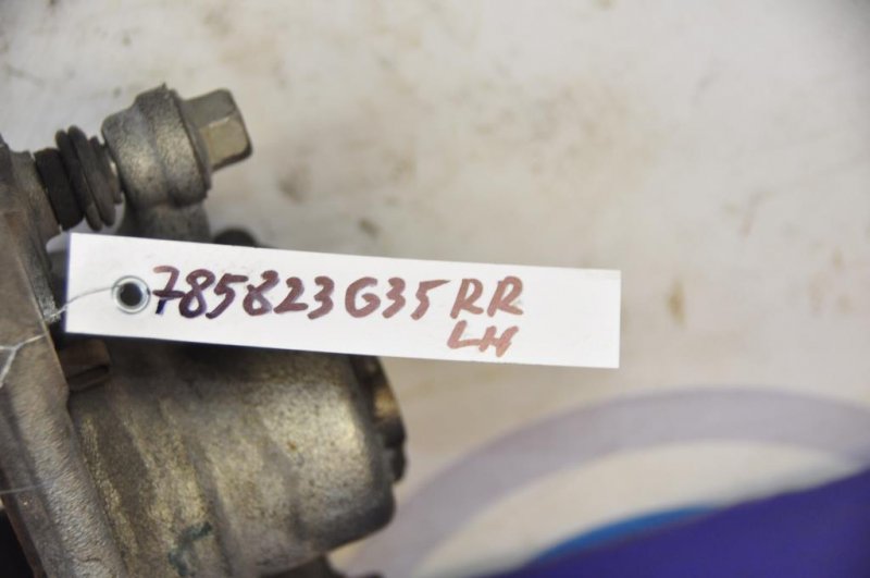 Суппорт тормозной задний левый INFINITI Q50 15-20