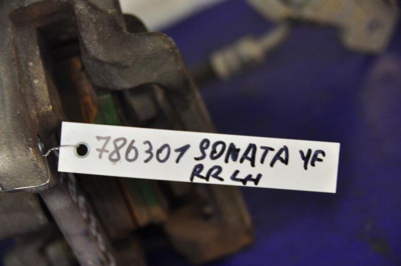 Суппорт тормозной задний левый SONATA YF 10-14 Суппорт тормозной задний левый SONATA YF 10-14
