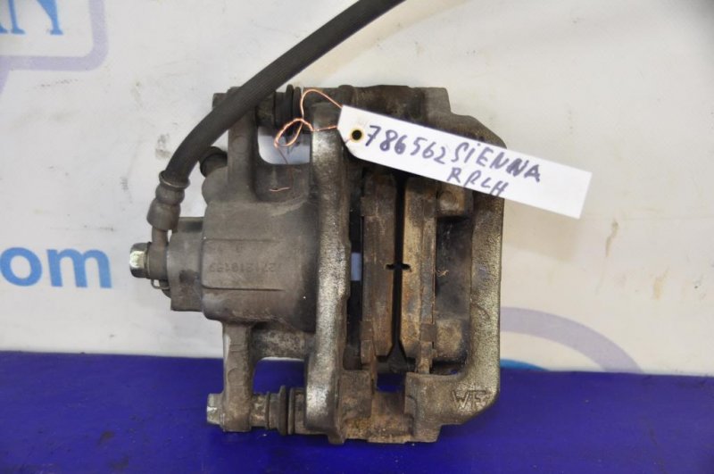 Суппорт тормозной задний левый SIENNA 11-16