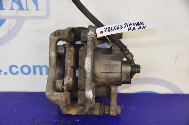 Суппорт тормозной задний правый SIENNA 11-16