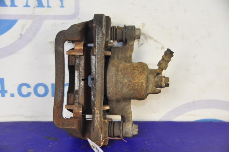 Суппорт тормозной задний правый IMPREZA 07-11 GE/GH