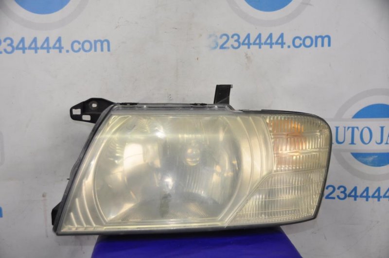 Фара передняя левая MITSUBISHI PAJERO 99-06 MN133743 Б/У