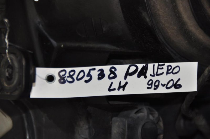 Фара передняя левая PAJERO 99-06