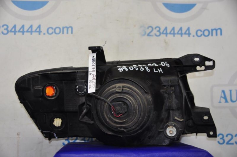 Фара передняя левая MITSUBISHI PAJERO 99-06