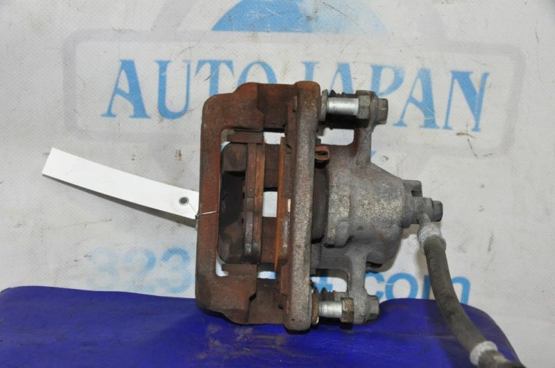 Суппорт тормозной задний левый KIA SOUL AM 08-13 Суппорт тормозной задний левый KIA SOUL AM 08-13