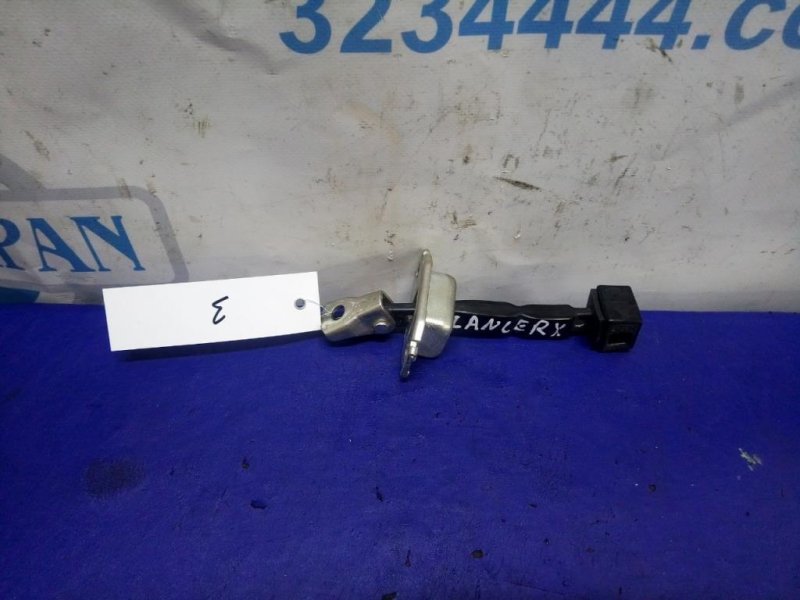 Ограничитель двери передний правый LANCER X 10 07-15