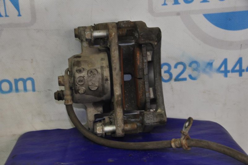 Суппорт тормозной передний левый TOYOTA PRIUS - 30 09-17