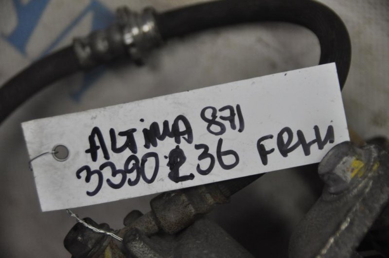 Суппорт тормозной передний левый ALTIMA L33 12-18 2015 L33 2.5