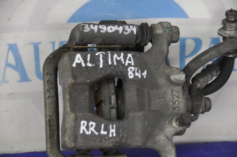 Суппорт тормозной задний левый ALTIMA L33 12-18 L33