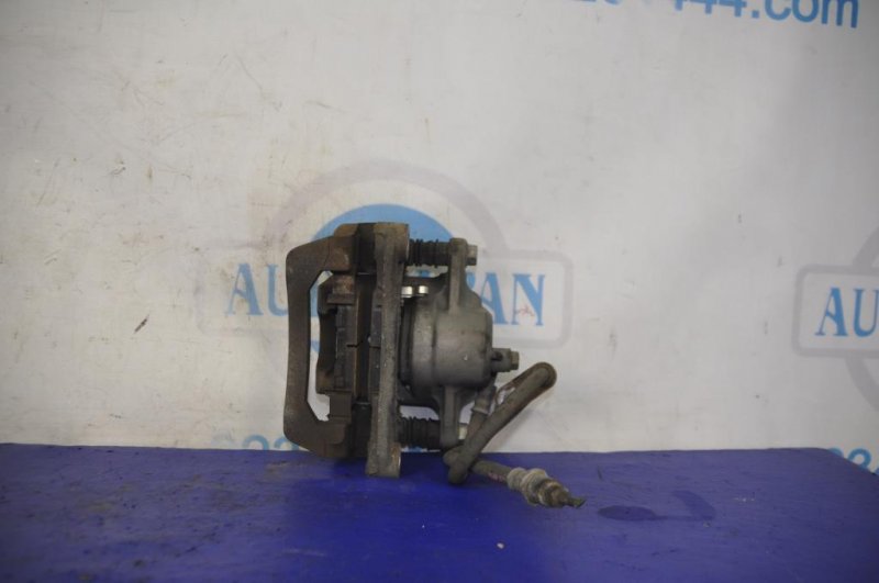 Суппорт тормозной задний левый SUBARU OUTBACK 09-14 BR Внедорожник 2.5