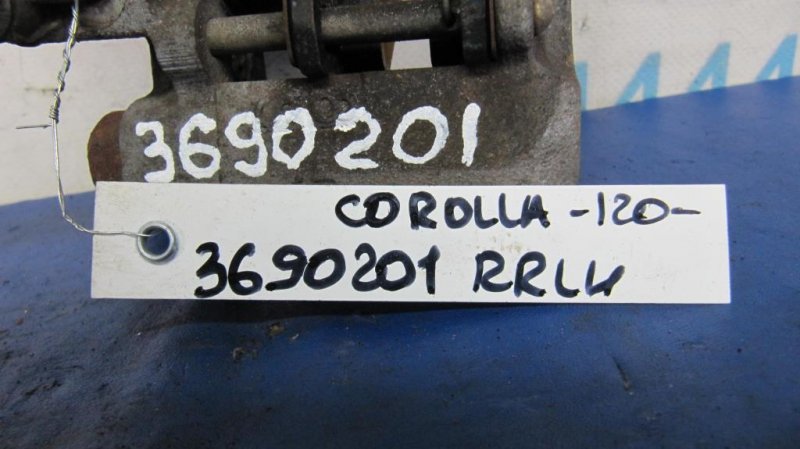 Суппорт тормозной задний левый COROLLA 120 00-07