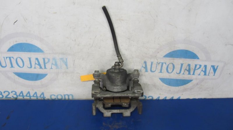 Суппорт тормозной задний левый INFINITI QX60/JX35 12-20