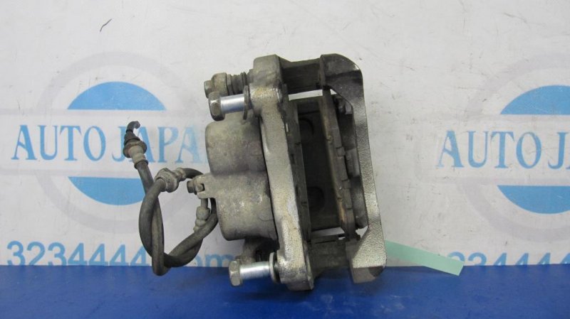 Суппорт тормозной передний левый INFINITI QX60/JX35 12-20