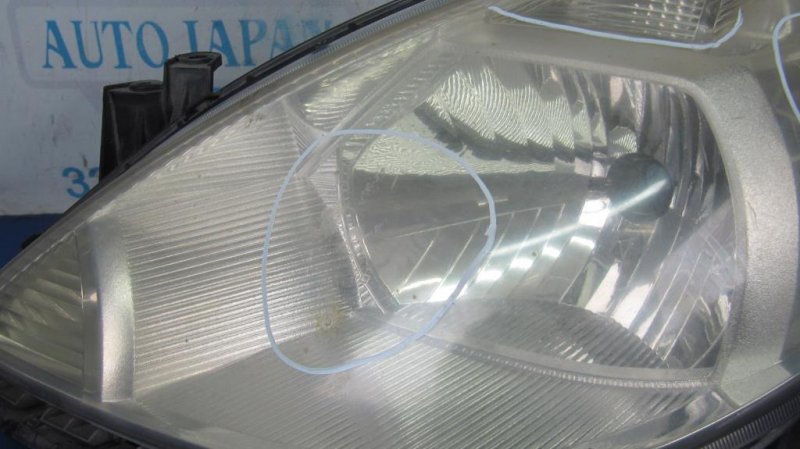 Фара передняя левая TIIDA/VERSA C11 04-11