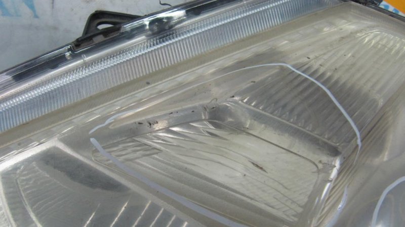 Фара передняя левая TIIDA/VERSA C11 04-11