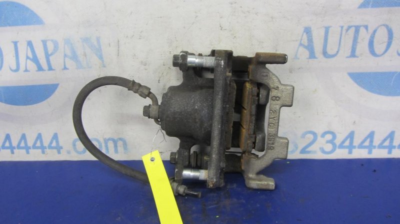 Суппорт тормозной задний левый INFINITI QX60/JX35 12-20