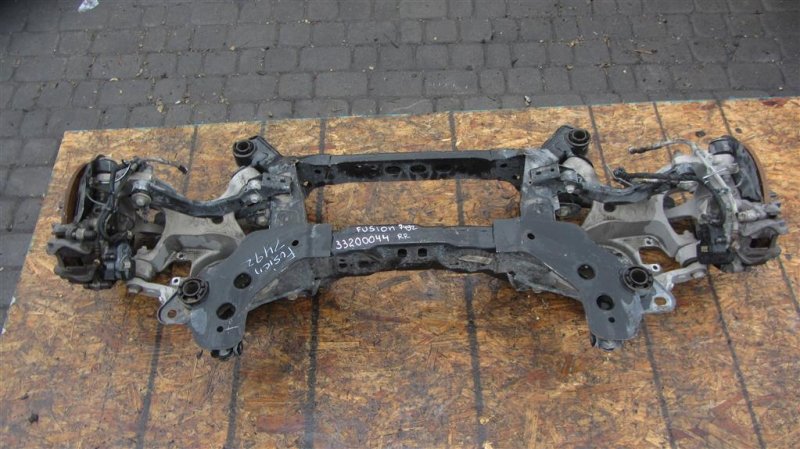 Запчасть балка задней подвески FORD FUSION 14- 2014 Седан 2.5 HG9Z-5035-A Б/У Балка задней подвески FORD FUSION 14- 2014 Седан 2.5 HG9Z-5035-A Б/У