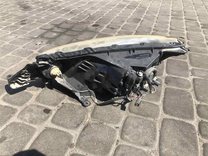 Фара передняя правая NISSAN NV200 EU 09-