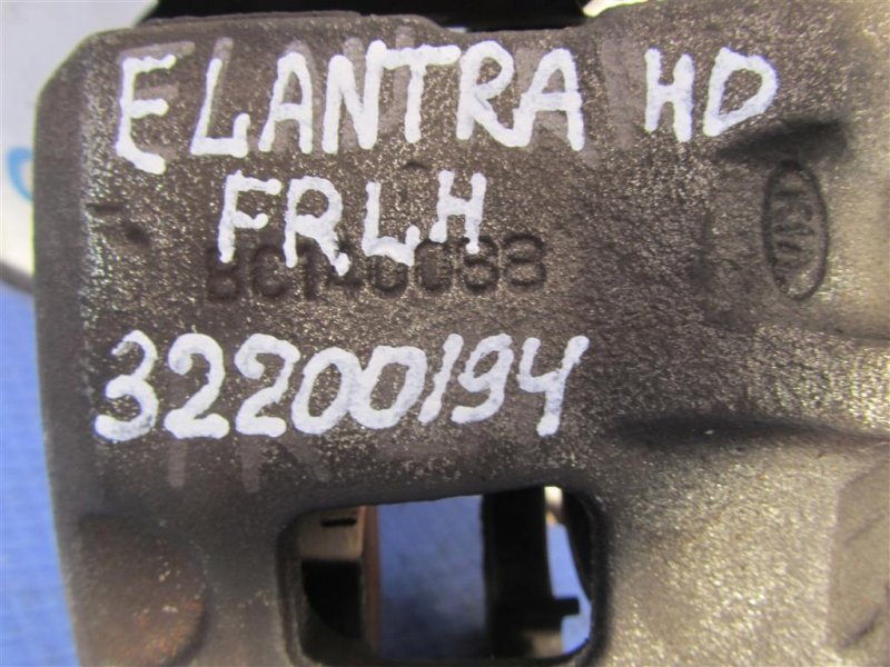 Суппорт тормозной передний левый ELANTRA HD 06-11