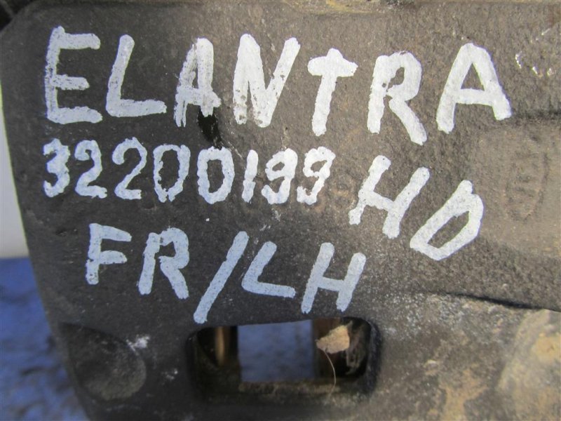 Суппорт тормозной передний левый ELANTRA HD 06-11