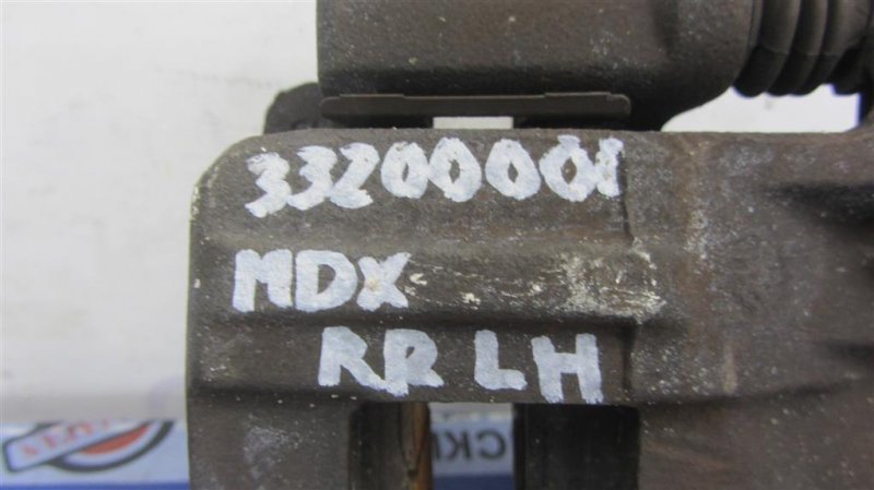 Суппорт тормозной задний левый MDX (YD2) 06-13 YD2