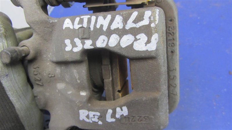 Суппорт тормозной задний левый ALTIMA L33 12-18 2014 L33 2.5