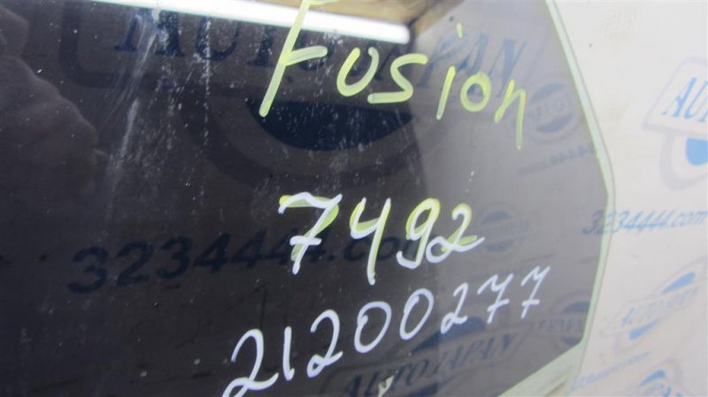 Стекло двери заднее левое FUSION 14- 2014 Седан 2.5