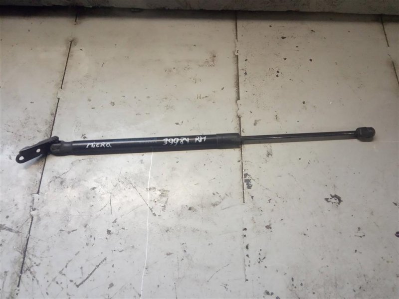 Запчасть амортизатор крышки багажника правый NISSAN MICRA 03-11 90450-AX60B Б/У Амортизатор крышки багажника правый NISSAN MICRA 03-11 90450-AX60B Б/У