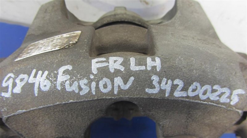 Суппорт тормозной передний левый FUSION 14- 2015 Седан 2.5