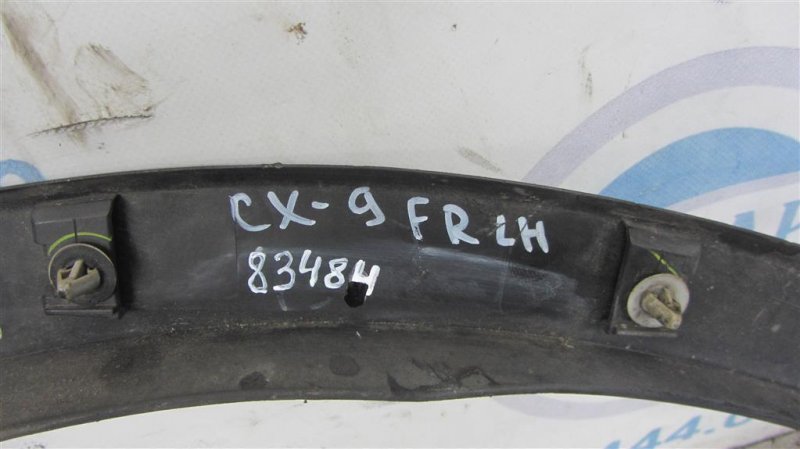 Накладка крыла (расширитель арки) передняя левая CX-9 06-16 Накладка крыла (расширитель арки) передняя левая CX-9 06-16