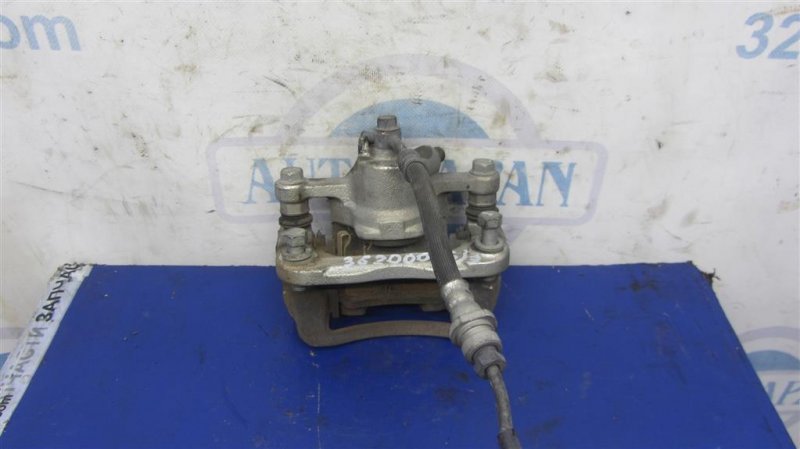 Суппорт тормозной задний левый KIA SOUL PS 13-19