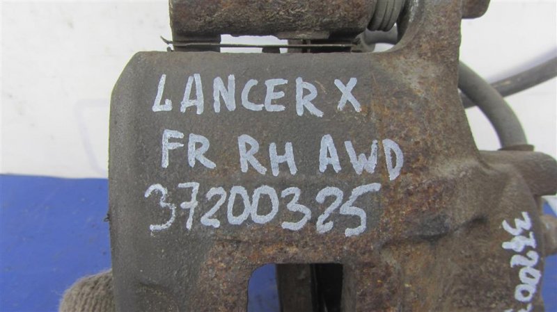 Суппорт тормозной передний правый MITSUBISHI LANCER X 10 07-15