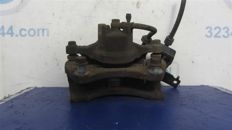 Суппорт тормозной передний правый LANCER X 10 07-15