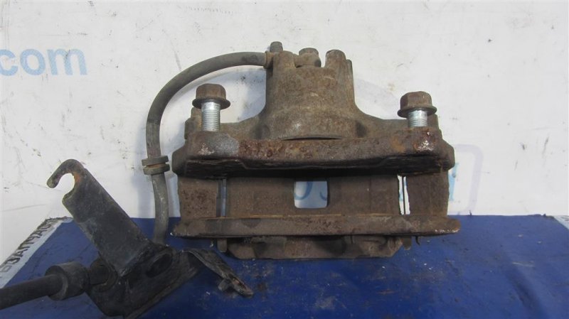 Суппорт тормозной передний левый MITSUBISHI LANCER X 10 07-15