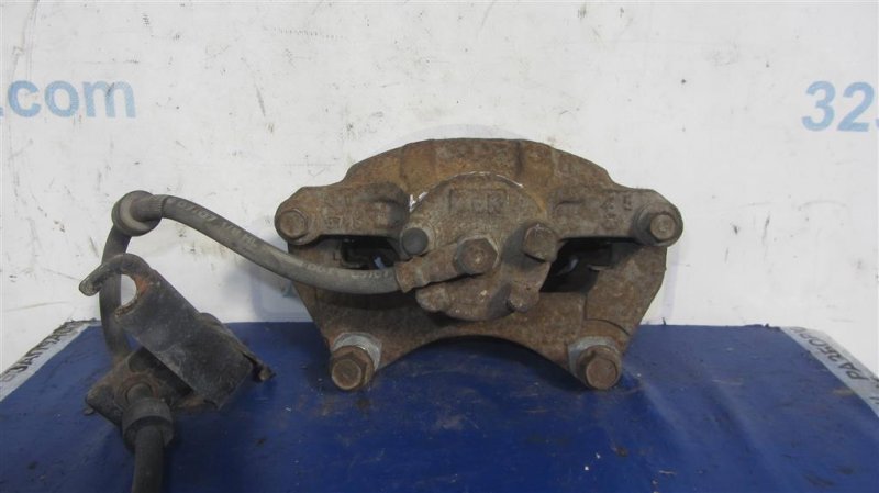 Суппорт тормозной передний левый LANCER X 10 07-15