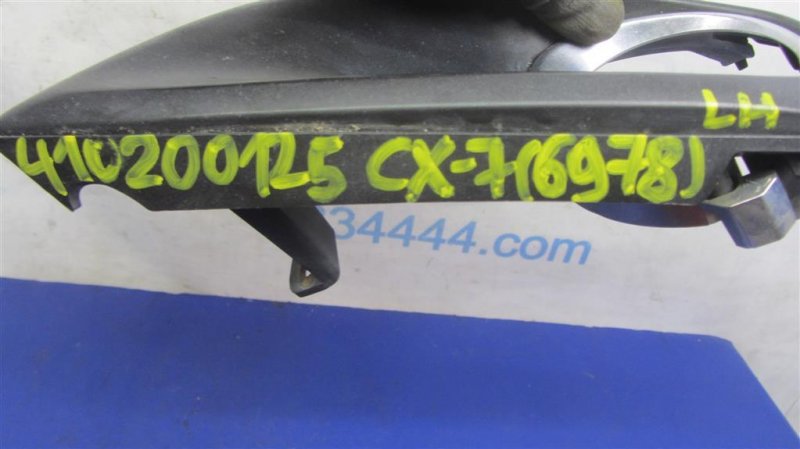 Накладка противотуманной фары передняя левая CX-7 06-12