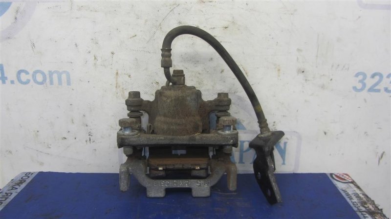 Суппорт тормозной задний левый INFINITI G25/G35/G37/Q40 06-14 Седан 3.7 VQ37VHR