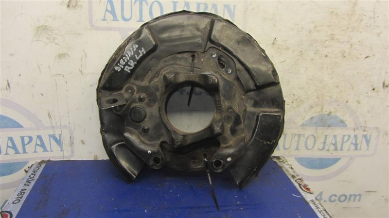 Тормозной механизм левый TOYOTA SIENNA 11-16