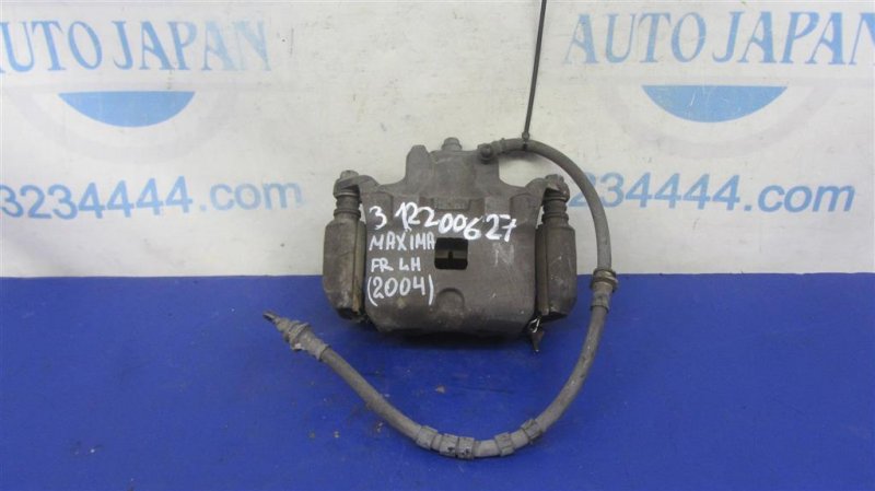 Суппорт тормозной передний левый NISSAN MAXIMA A34 03-08 41011-7Y000 Б/У