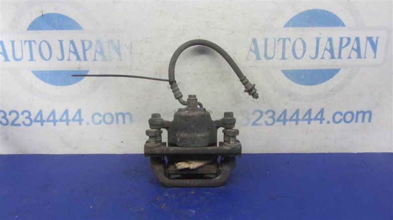 Суппорт тормозной задний правый NISSAN MAXIMA A34 03-08