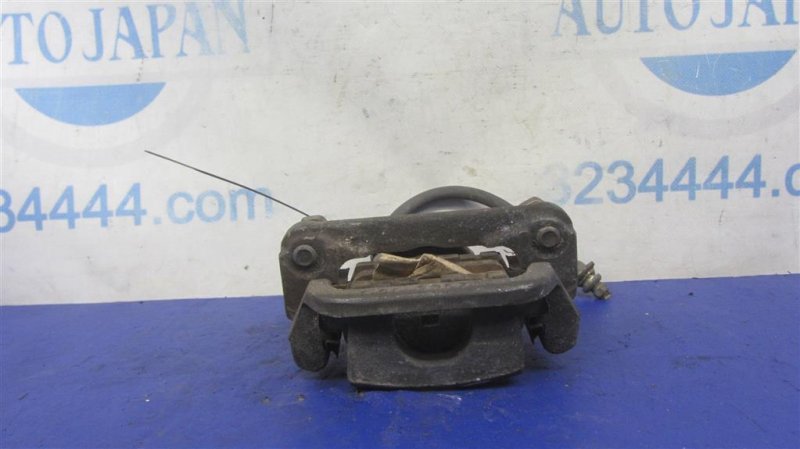 Суппорт тормозной задний правый MAXIMA A34 03-08