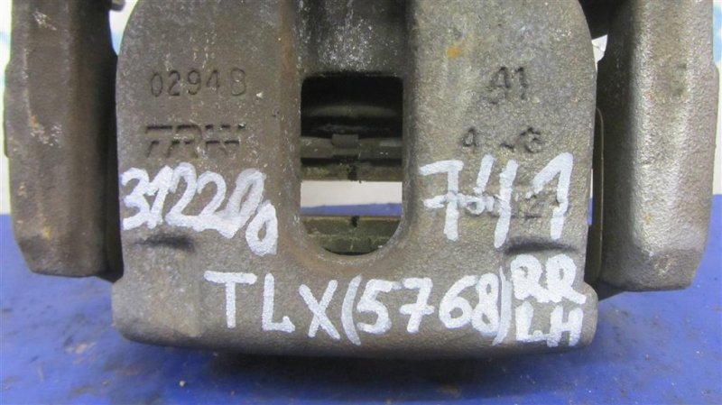 Суппорт тормозной задний левый TLX 14-17 2015 Седан 2.4