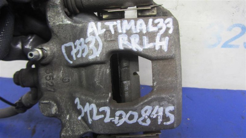 Суппорт тормозной задний левый ALTIMA L33 12-18 2016 L33 2.5
