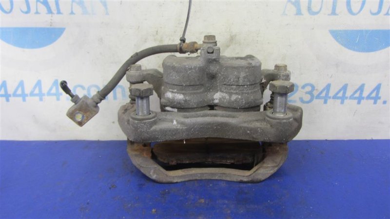 Суппорт тормозной передний левый INFINITI M35/M45 04-10