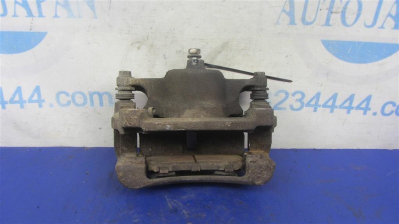 Суппорт тормозной передний левый NISSAN X-TRAIL/ROGUE T32 13-20